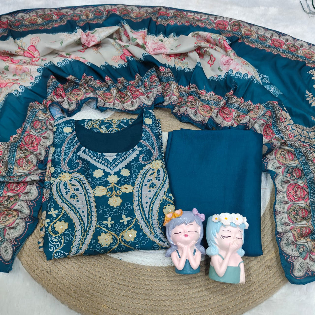 Ivory Pakistani Suit which is beautifully decorated with digital prints