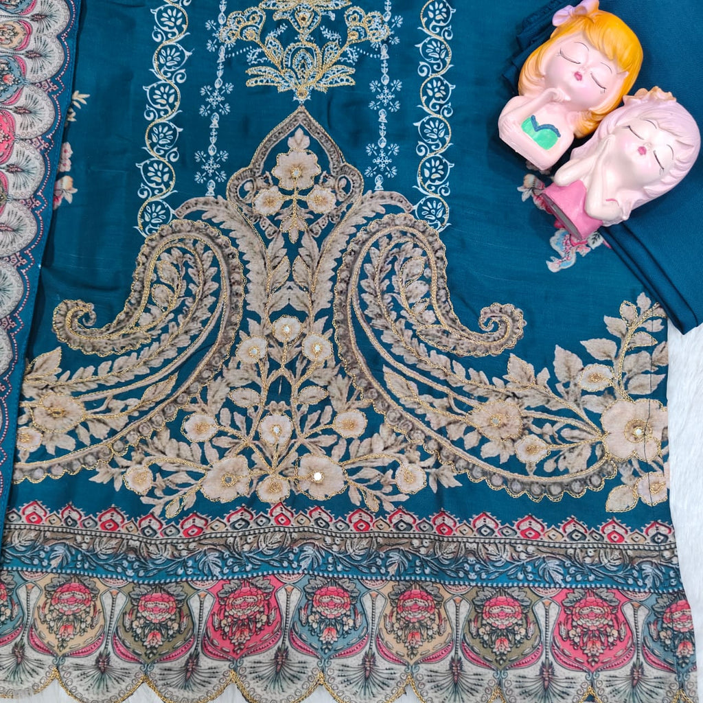 Ivory Pakistani Suit which is beautifully decorated with digital prints