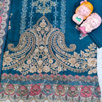 Ivory Pakistani Suit which is beautifully decorated with digital prints