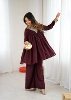 2-Piece Stylish Ensemble: Includes a well-fitted top and coordinated bottom