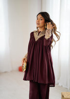 2-Piece Stylish Ensemble: Includes a well-fitted top and coordinated bottom