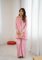 2-Piece Stylish Ensemble: Includes a well-fitted top and coordinated bottom