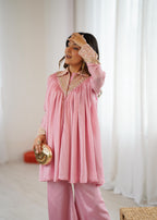 2-Piece Stylish Ensemble: Includes a well-fitted top and coordinated bottom